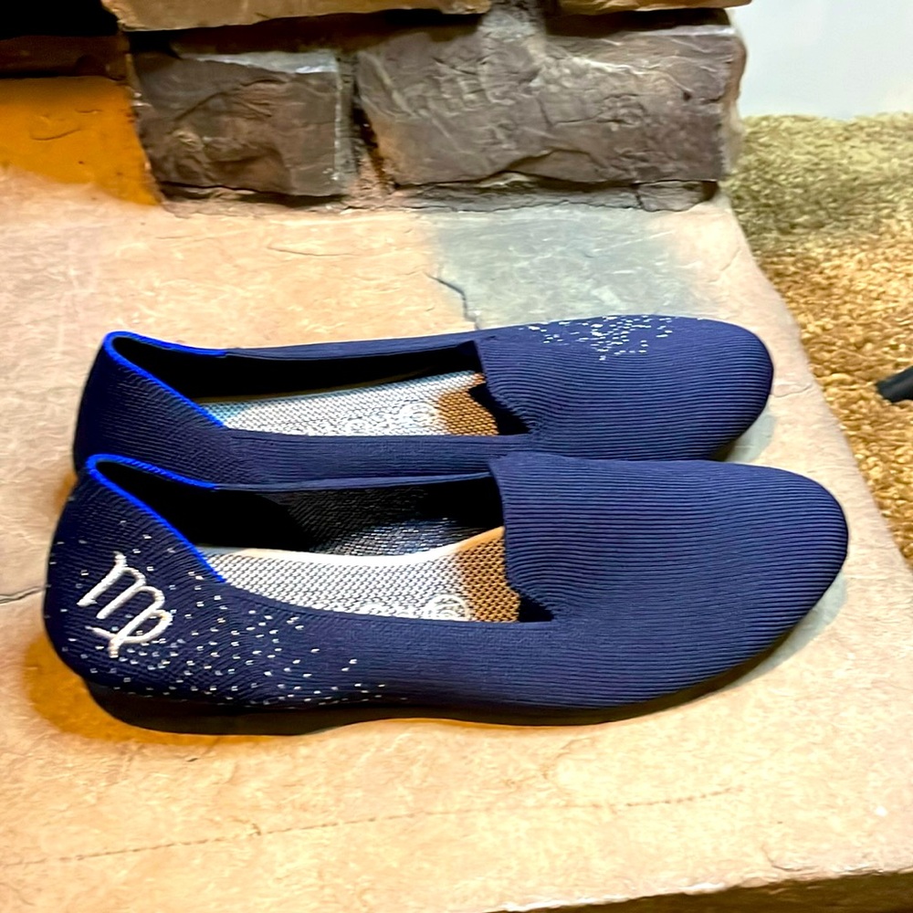 Rothy's Navy Slip-On Flats with Silver Virgo Accent